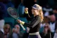 Katie Boulter celebrates winning her women's singles final m