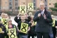 Scottish First Minister and SNP leader John Swinney giving a