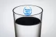 
The logo of water company Thames Water seen through a glass
