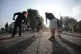 Volunteers sweep Sussex Road in Southport, Merseyside, after