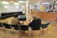 Patients sitting in the waiting room at a GP practice