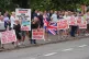 FACES OF HATE: Thugs seek
to intimidate refugees housed
in a