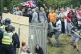 Objects are thrown during an anti-immigration protest outsid