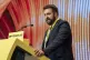 Plaid Cymru's Luke Fletcher speaks with delegates during the