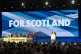 First Minister John Swinney delivers his address at the SNP 
