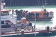 A group of people thought to be migrants are brought in to D