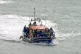 A group of people are brought in to Dover, Kent, onboard the
