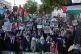 People take part in a Palestine Solidarity Campaign rally on