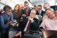 Prime Minister Keir Starmer talks to the media on board his 