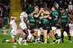 Northampton Saint's Angus Scott-Young (centre) celebrates hi