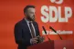 Colum Eastwood speaking during the Social Democrat and Labou