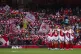 Arsenal fans waving flags during the Women's Super League ma