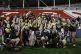 York Valkyrie's players celebrate with the trophy after winn