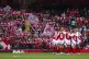 Arsenal fans waving flags in the stands before the Women's S