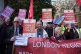 Campaigners take part in a protest against the government's 