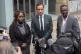Solicitor Aamer Anwar (centre) alongside Skehu Bayoh's siste