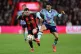 Bournemouth's Adam Smith (left) and Arsenal's Gabriel Martin