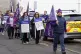 Striking school support workers take part in a demonstration