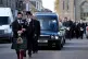 The funeral cortege leaves the funeral service for former fi