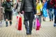 A man carrying bags in the Broadmead shopping area of Bristo