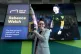 Former football referee Rebecca Welch poses with her award d
