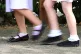 A photo of school girls walking to school
