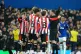 Brentford's Christian Norgaard reacts after being shown a re