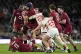 England's George Martin is tackled while running with the ba