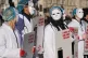 People take part in a demonstration outside the Houses of Pa