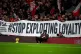 Liverpool fans with a banner that reads #Stop Exploiting Loy