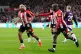 Brentford's Bryan Mbeumo (left) celebrates with team-mate Yo