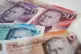 A view of £5, £10, £20 and £50 bank notes