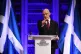 First Minister John Swinney giving a speech at Playfair Libr