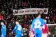 Manchester United fans unveil a banner in protest of increas