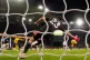 Wolverhampton Wanderers' Matheus Cunha (second left) scores 