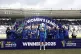Chelsea players celebrate with the trophy following the Wome