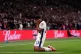 Myles Lewis-Skelly celebrates scoring England's first goal o