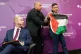 A protester interrupts Business Secretary Jonathan Reynolds 