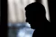 A silhouette of Prime Minister Sir Keir Starmer holding a pr