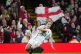 England's Abby Dow (centre) scores their sides fifth try of 
