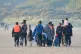 A group of people leave the beach in Gravelines, France, fol