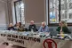 L-R on table, Sophie Johnson Stop the War Scotland secretary
