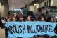 Climate activists occupy a Tesla showroom in Westfield Sheph