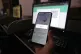 A Pakistani waits to connect his mobile WhatsApp with a desk