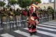 DEMOCRACY NOW: An anti-government protester walks next to a 