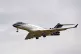 A private jet (no clear markings or registration), comes in 