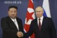 Russian President Vladimir Putin (right) and North Korea's l