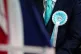 A person wearing a Reform UK rosette at the party's launch o