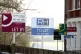 Estate agent signs placed outside homes, April 3, 2016