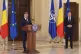 Prime Minister designate Marcel Ciolacu (left) speaks after 